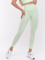 Damskie, jasnozielone, sportowe legginsy z wysoką talią, które napinają i modelują sylwetkę