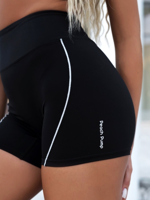 Спортен дамски клин в черно с бели ленти и бял надпис