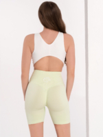 Top sport alb de damă, cu spatele gol și căptușeală.