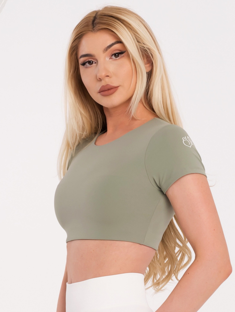 Къса спортна блуза с подплънки, които могат да се махат в зелено