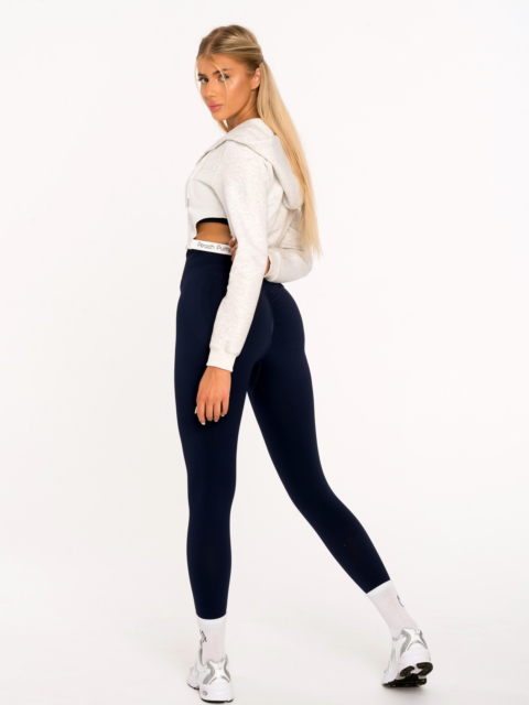 Светло сив къс спортен суичър с надписи на талията и отвори