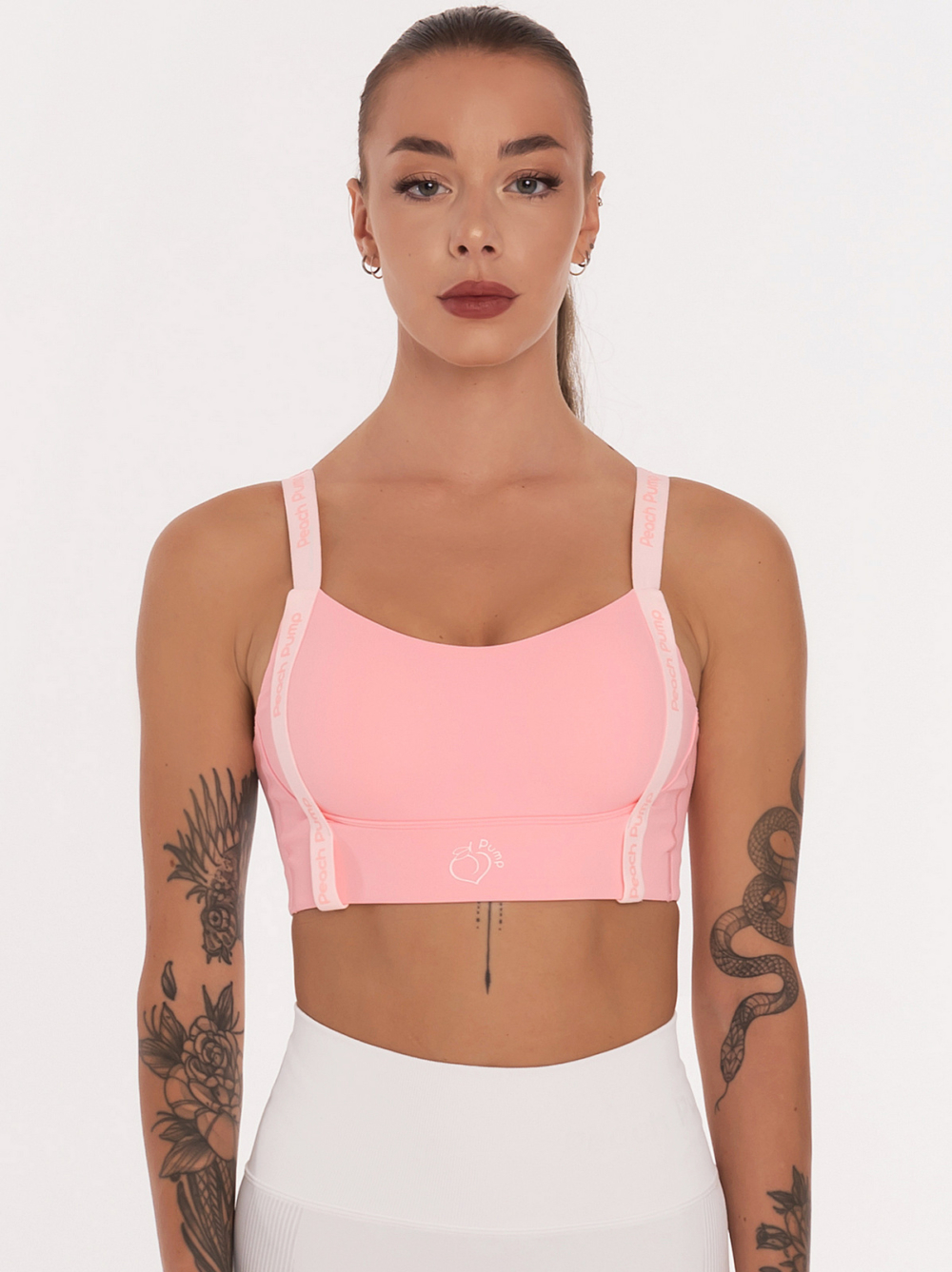 Ροζ αθλητικό μπουστάκι με επιγραφές Peach Pump μπροστά κατά μήκος και ενίσχυση