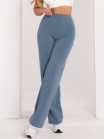 Niebieskie elastyczne legginsy damskie o szerokim kroju do fitnessu