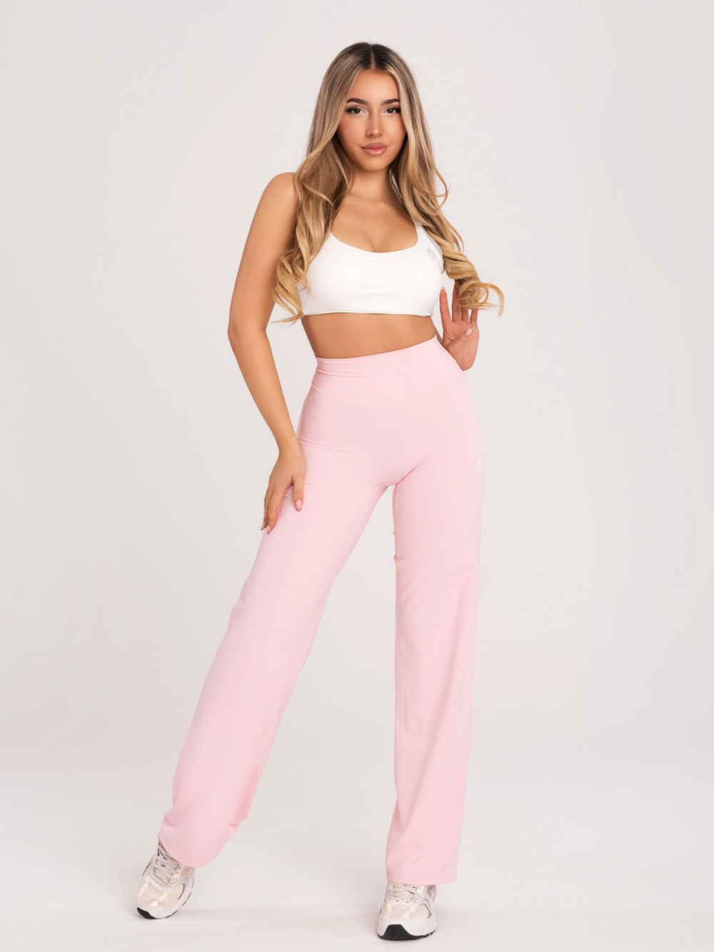 Ružové dámske športové legíny s rovným, širokým strihom na fitness